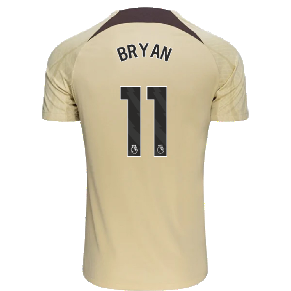 2023-2024 Tottenham Dri-Fit Strike Training Shirt (Team Gold) (Bryan 11)